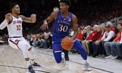 Braun leads No. 8 Kansas past St. John’s 95-75 at new arena